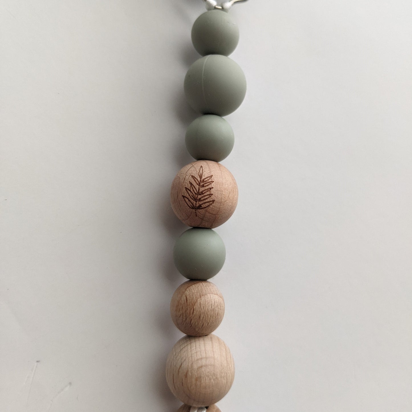 Mini Gender Neutral Pacifier Clip in Plant Green - Nature Inspired Silicone and Beechwood Soother Clip