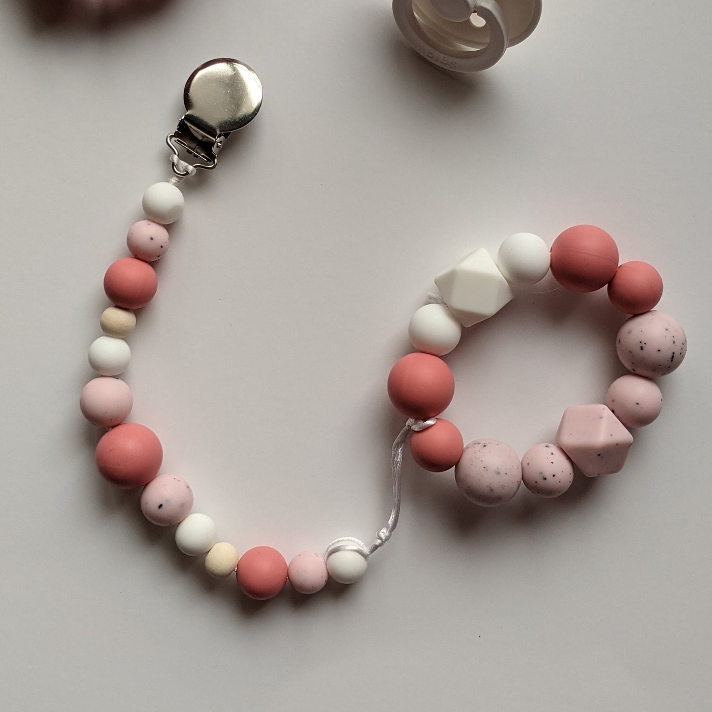 Discontinued - Teething Ring in Peppa Pink
